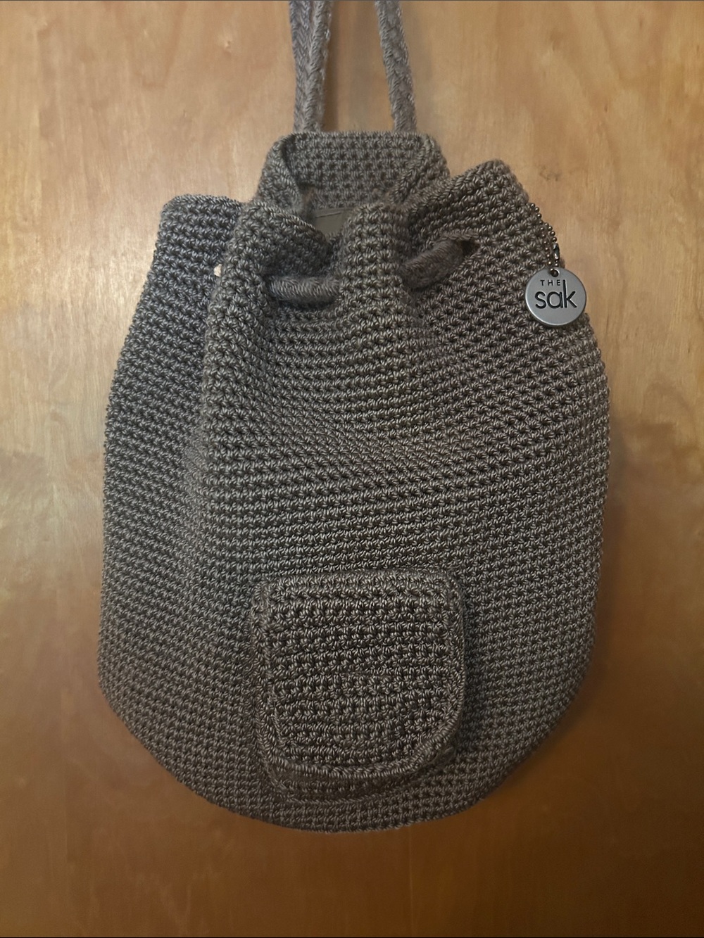 The Sak Taupe Crocheted Drawstring Backpack